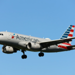 American Airlines plane at an airport with delays