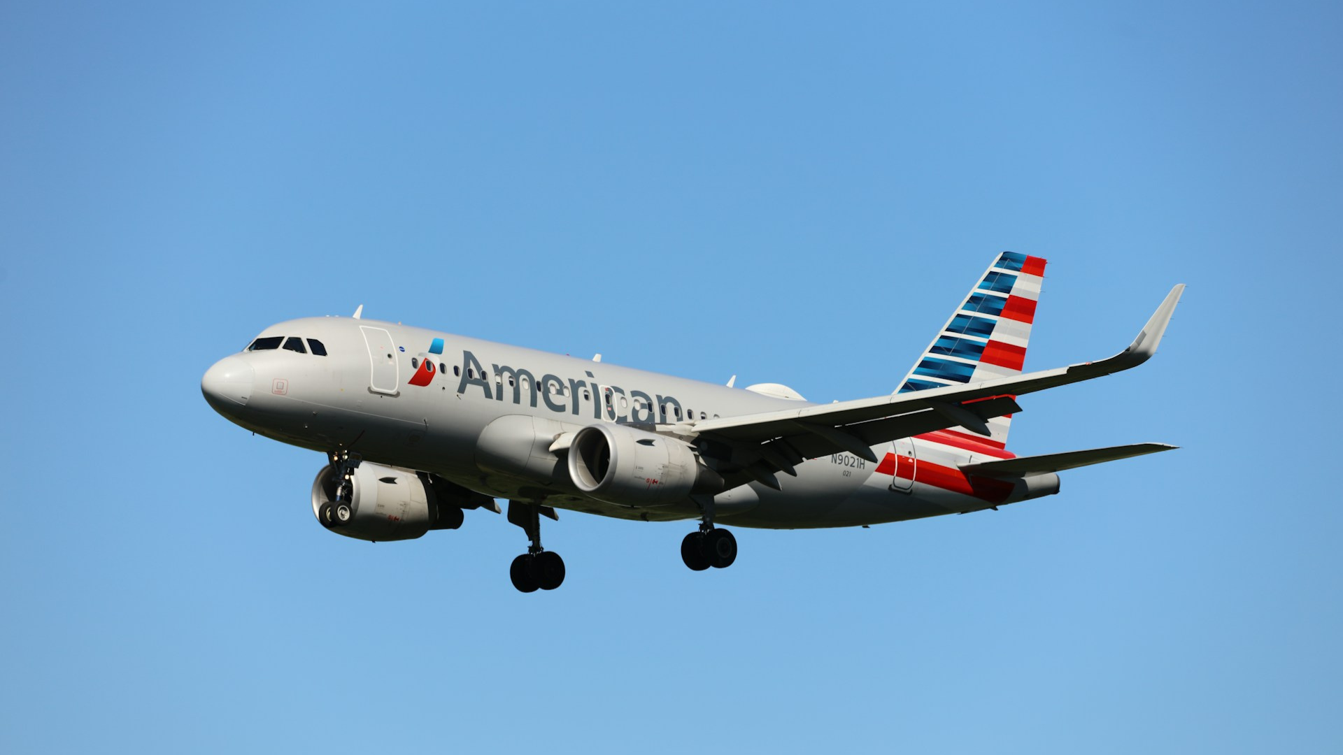 American Airlines plane at an airport with delays